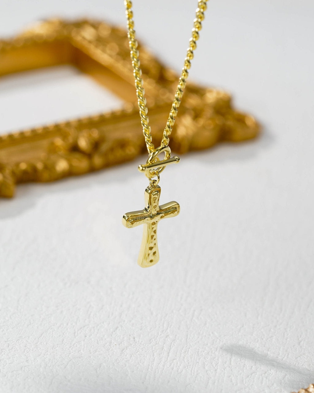 Gold Cross Necklace with Toggle Clasp