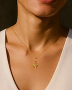 Gold Resurrection Cross Necklace
