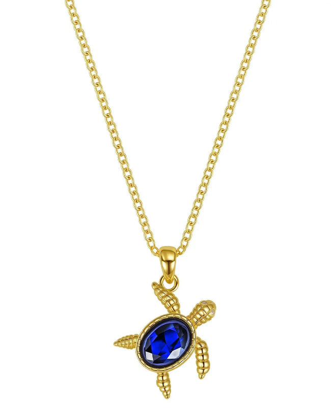 Gold Turtle Necklace with Blue Gem Hover Image