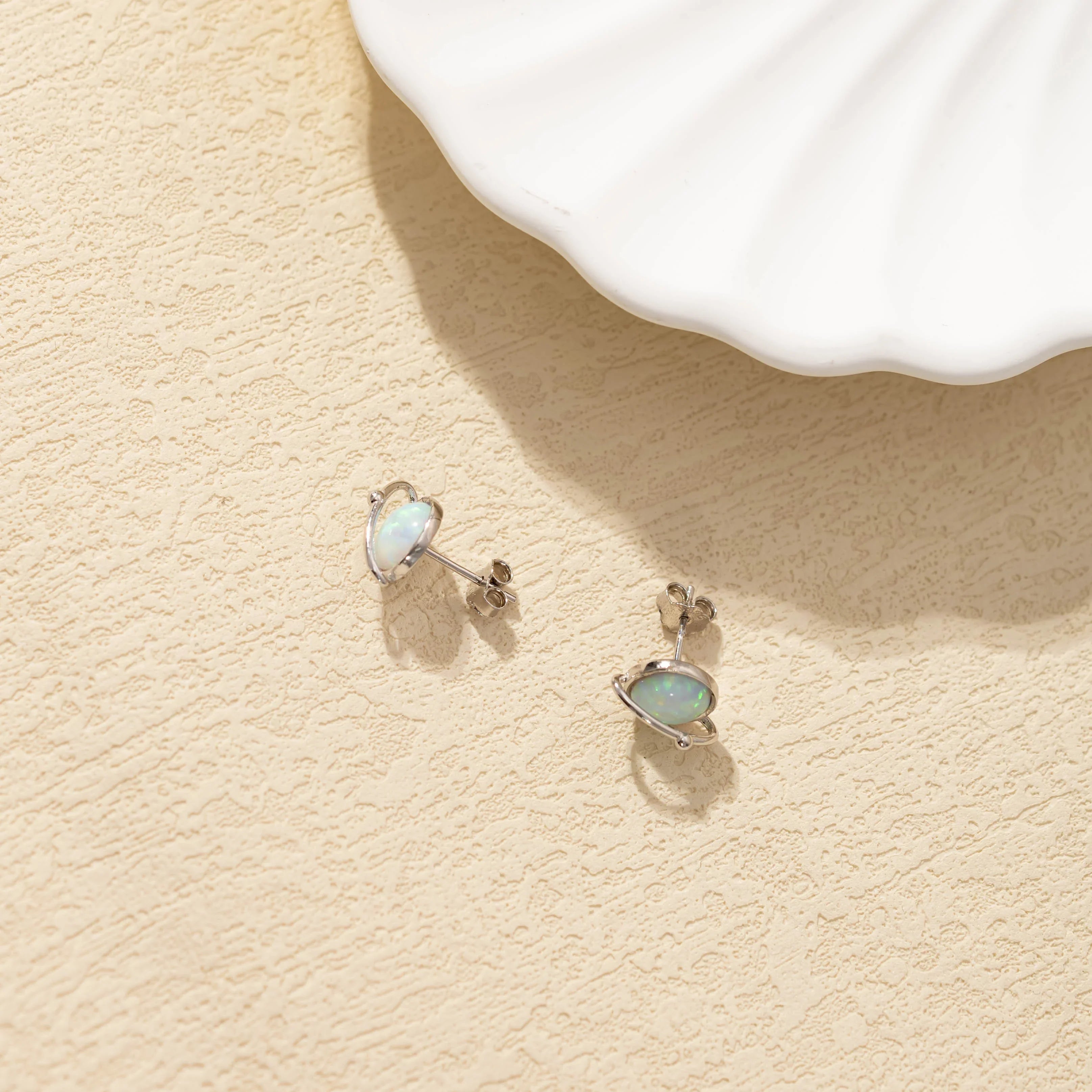 Round White Gold Opal Stud Earrings